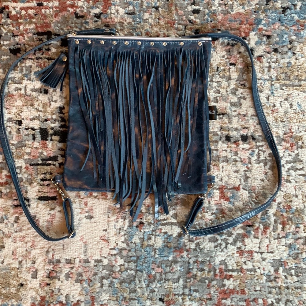 Your max co leather fringed backpack purse